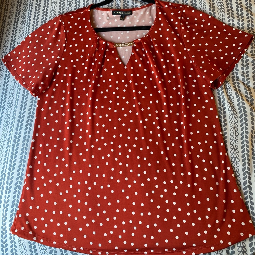 Women’s blouse. Burnt orange color